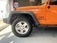ラングラー アンリミテッド オレンジ 4WD SMITTYBILTラック 社外ナビ バックカメラ